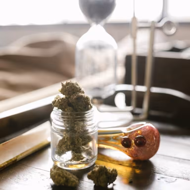 Cannabis Flowers on Glass Container